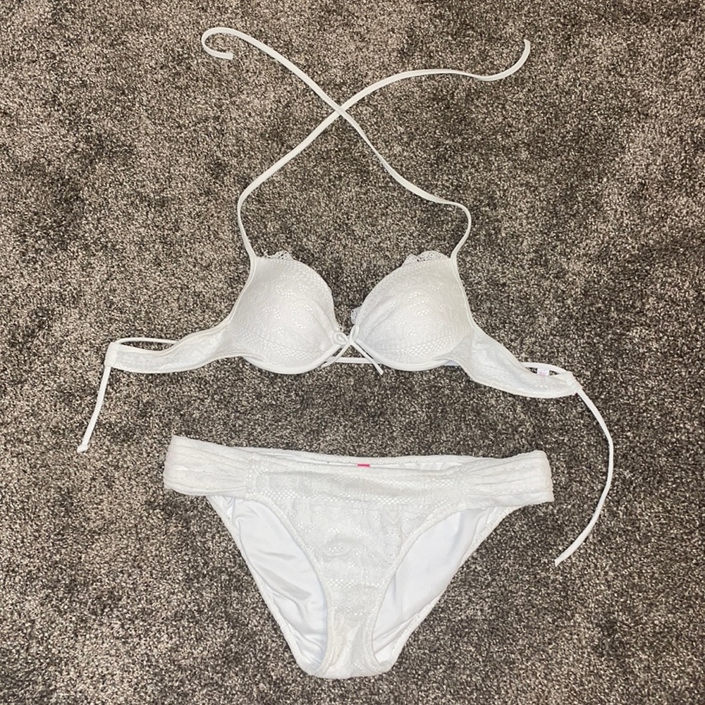 Victoria’s Secret white swim suit. Perfect condition. Top size 34B. Bottoms M.